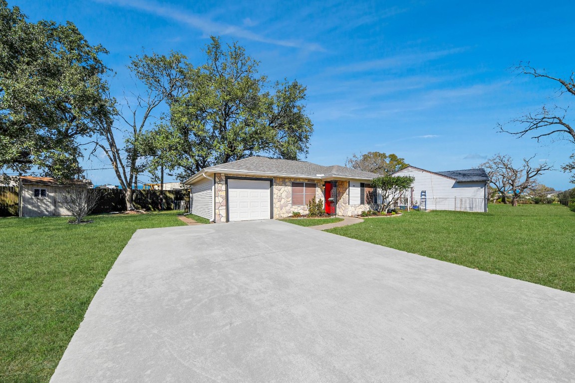 201 Delta Street Pasadena, TX 77506 - Photo 5 of 33 a view of a house with a yard