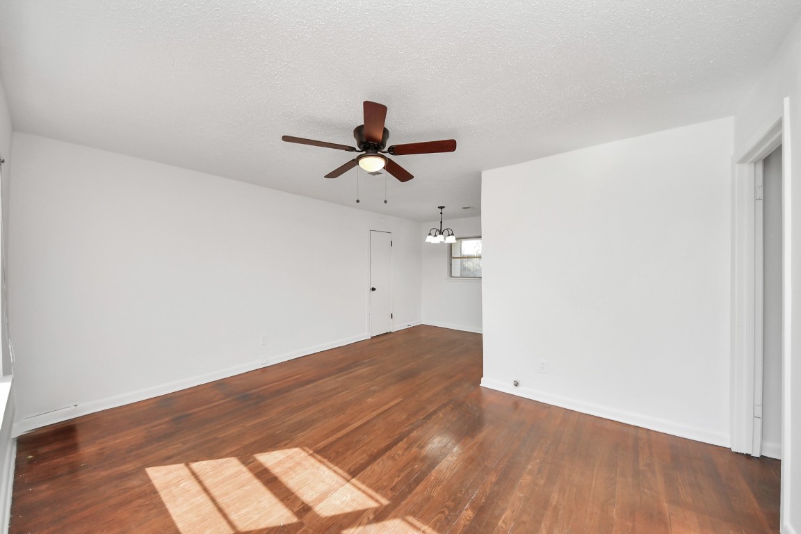 201 Delta Street Pasadena, TX 77506 - Photo 6 of 33 a view of empty room with wooden floor