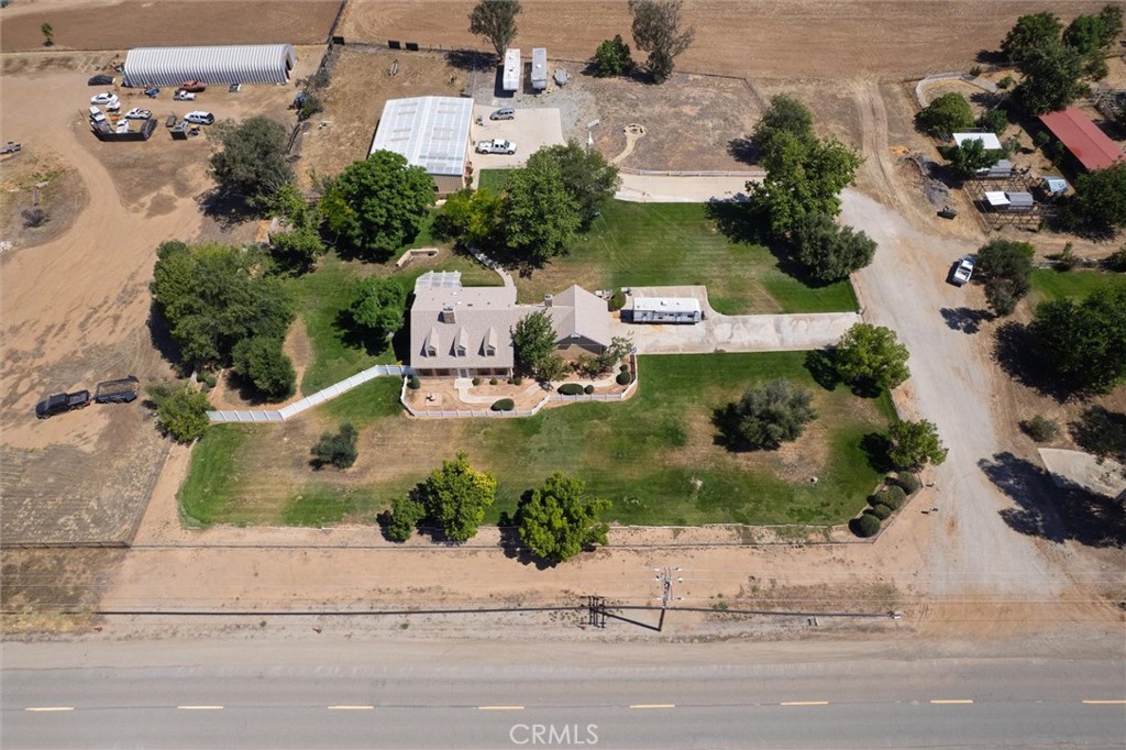 34150 Stowe Road Winchester, CA 92545 - Photo 2 of 80 an aerial view of a house with a yard and a garage