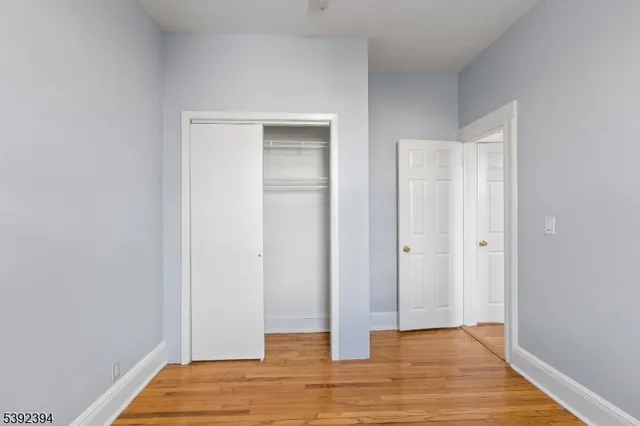 a view of bathroom with wooden floor