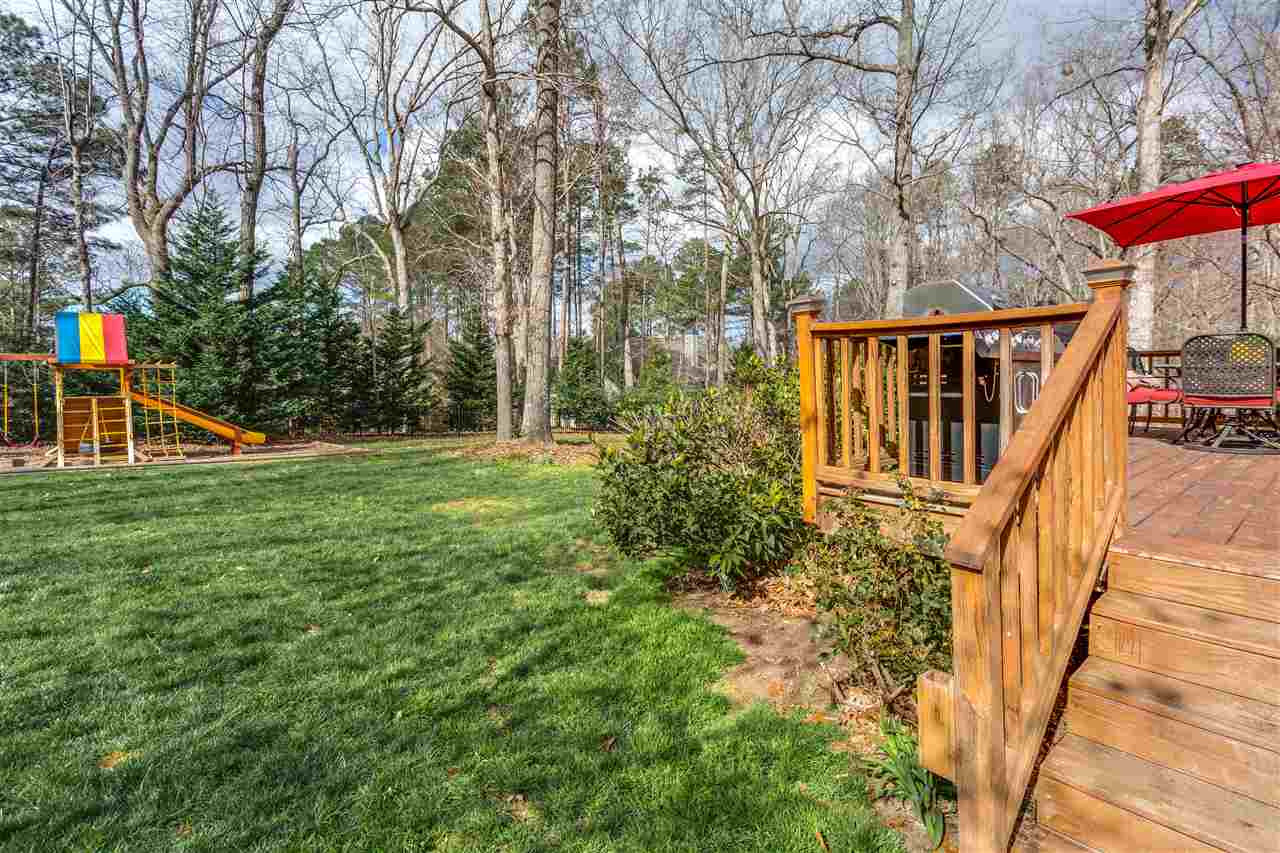 2117 Lovdal Drive Raleigh, NC 27613 - Photo 23 of 24 PERFECT BACK YARD FOR PLAY. MOSTLY FLAT & WITH BRAND NEW FENCING. Exterior Back