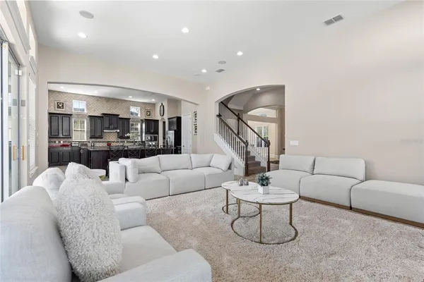 a living room with furniture and window
