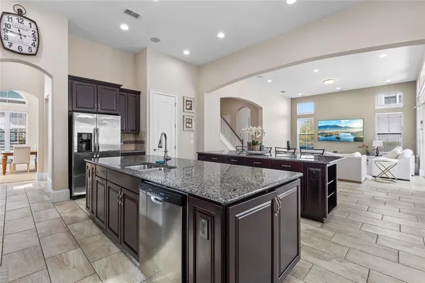 a dining room with furniture and window