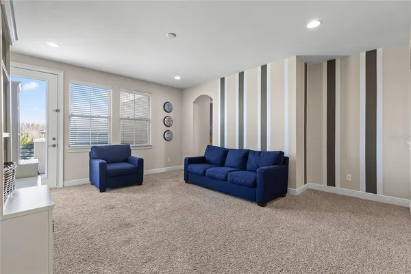 a bedroom with two beds and a window