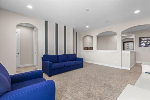 a bedroom with bed and a window