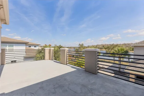 a house with palm tree in front of it