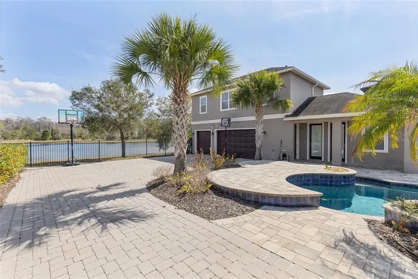 a bedroom with bed and a window