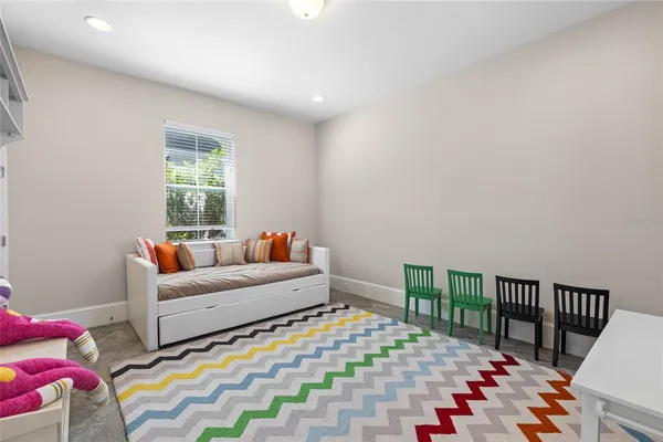 an aerial view of a house with a lake view