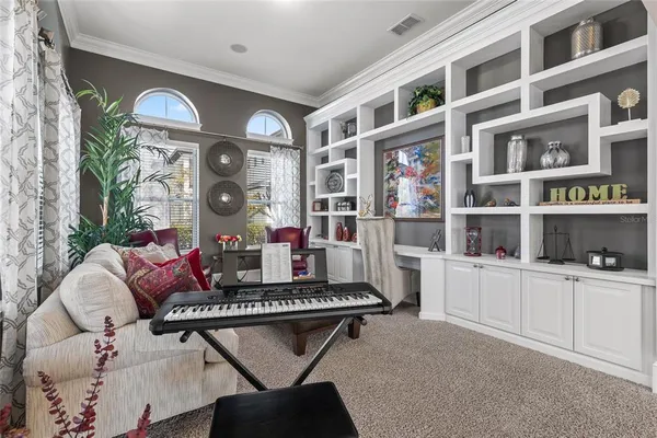a view of entryway with wooden floor and stairs