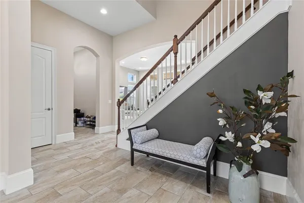 a bathroom with a sink and mirror with toilet