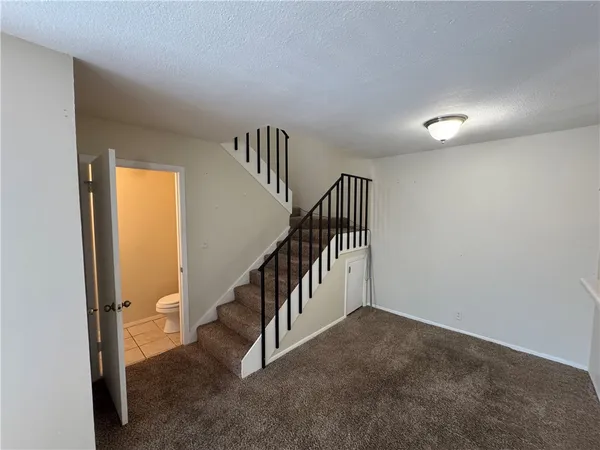 a view of an entryway with a hallway