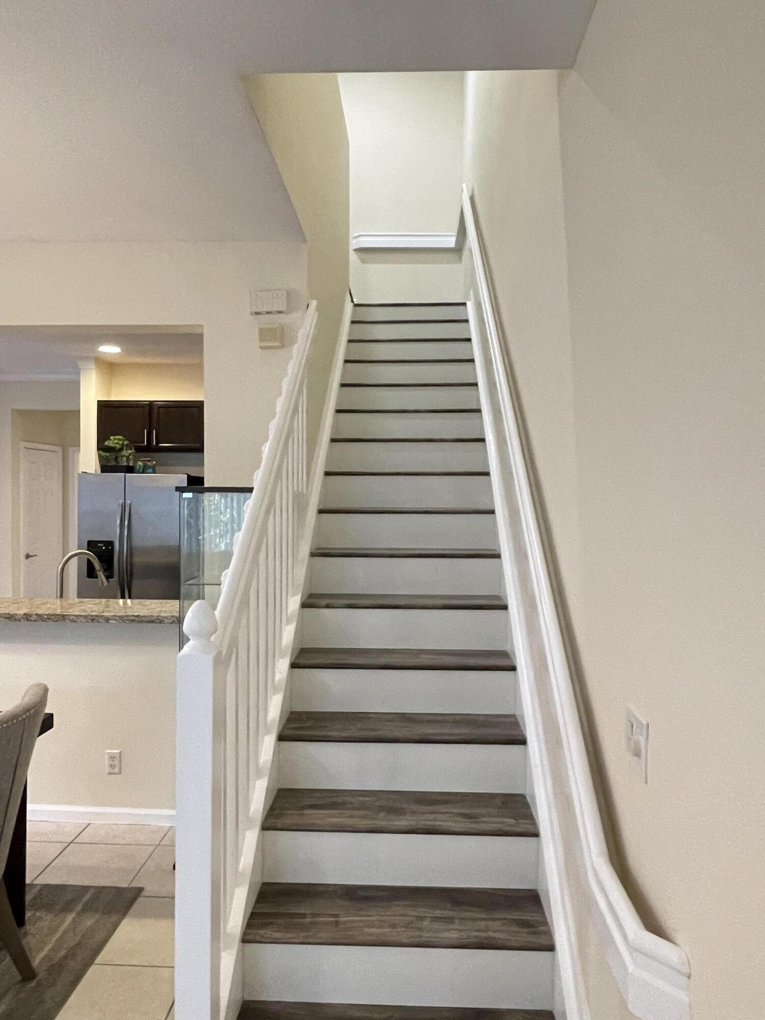 1021 Woodfield Road Greenacres, FL 33415 - Photo 14 of 32 STAIRS TO 2ND FLOOR
