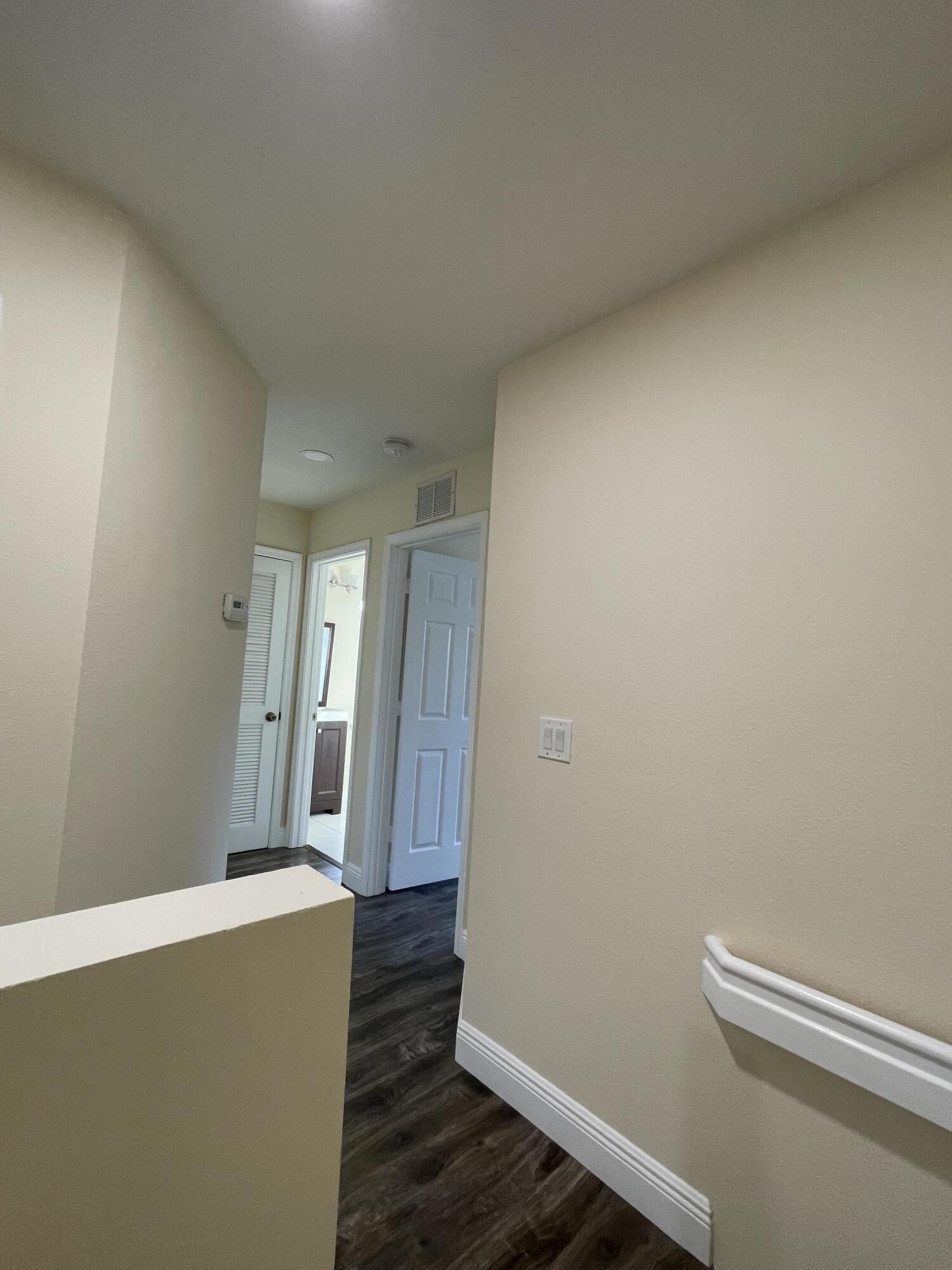 1021 Woodfield Road Greenacres, FL 33415 - Photo 15 of 32 ENTERING 2ND FLOOR