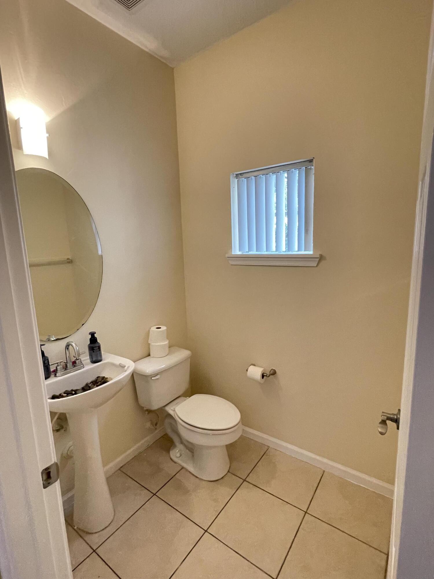 1021 Woodfield Road Greenacres, FL 33415 - Photo 10 of 32 HALF BATH