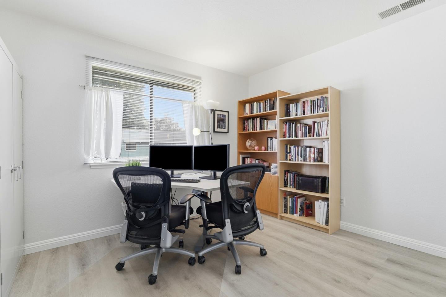 4013 Ralston Common Fremont, CA 94538 - Photo 19 of 40 a dining room with a table and chairs