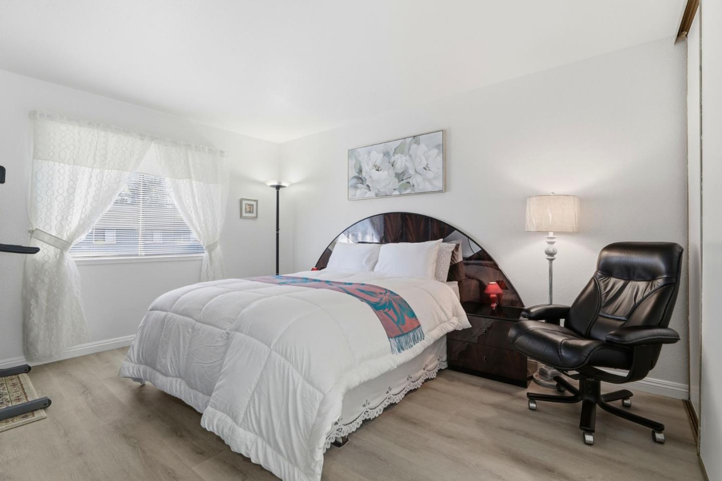 4013 Ralston Common Fremont, CA 94538 - Photo 20 of 40 a bedroom with a bed and a chair