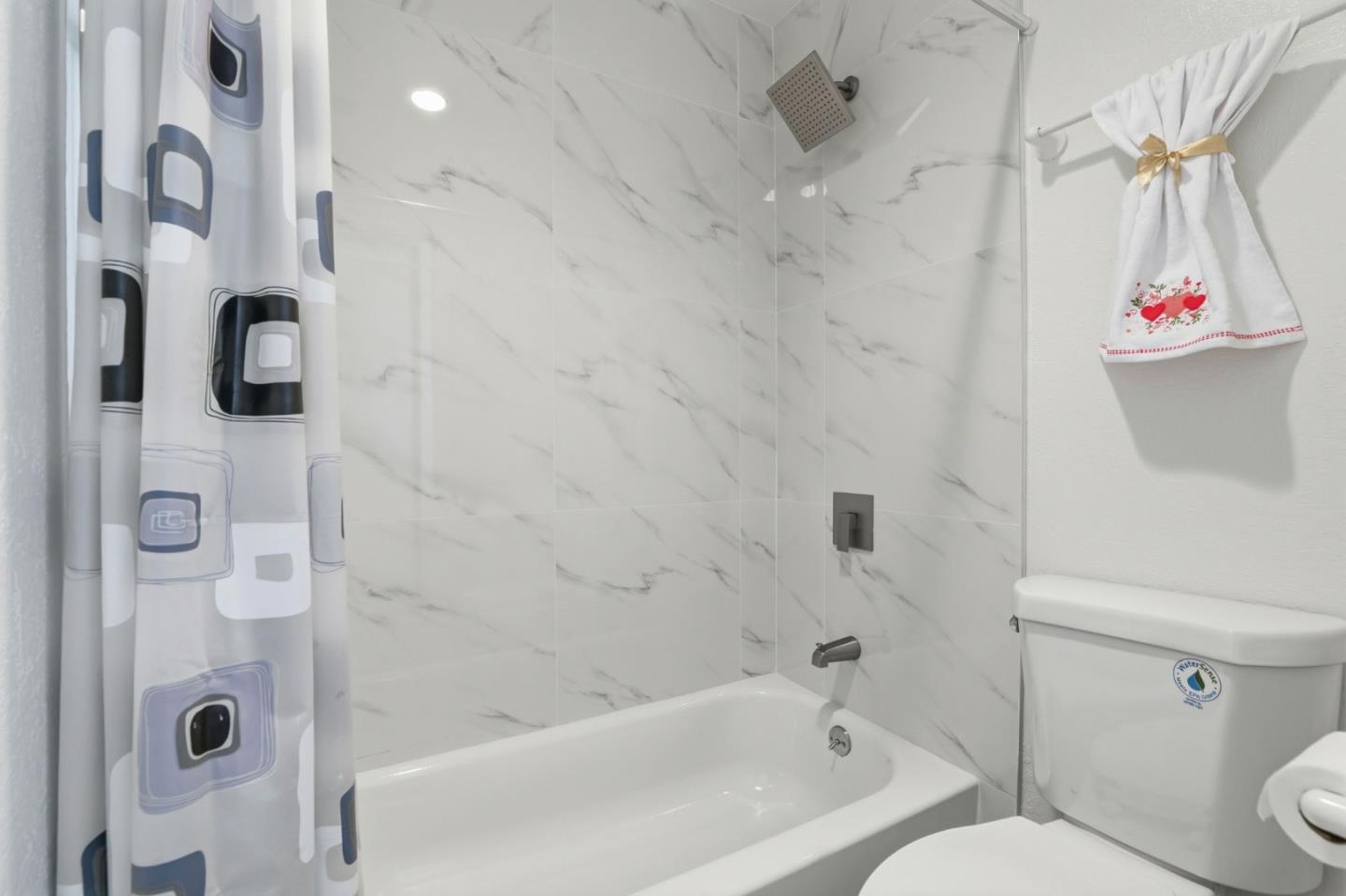 4013 Ralston Common Fremont, CA 94538 - Photo 24 of 40 a bathroom with a bathtub and shower