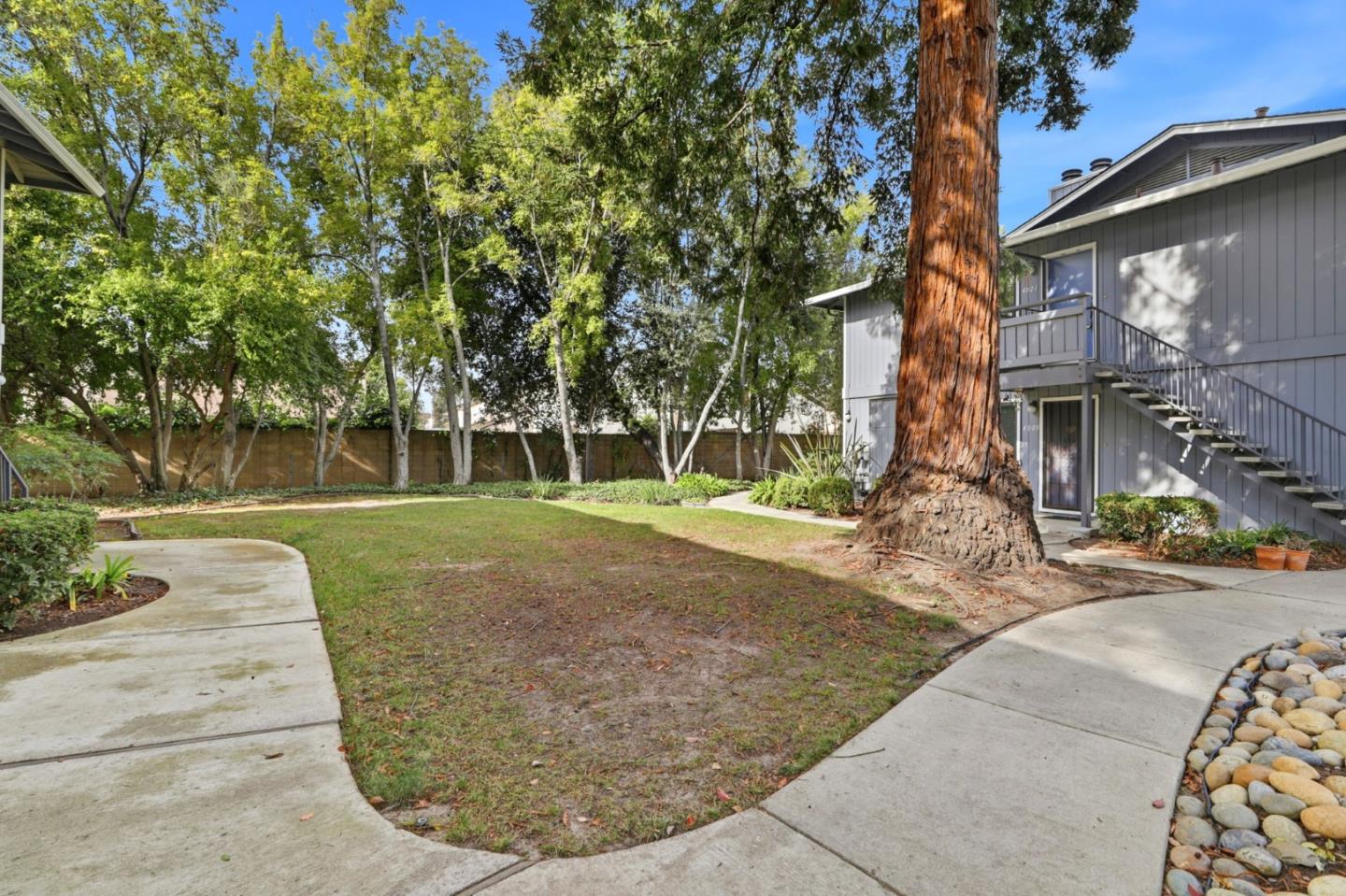 4013 Ralston Common Fremont, CA 94538 - Photo 29 of 40 front view of a house with a yard