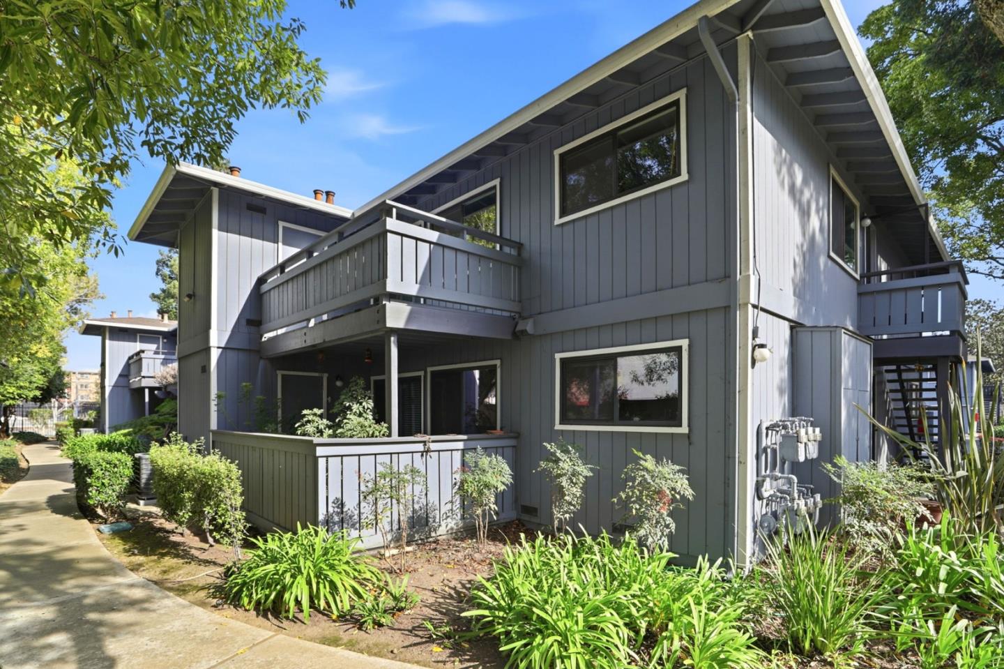 4013 Ralston Common Fremont, CA 94538 - Photo 3 of 40 a front view of a house with garden
