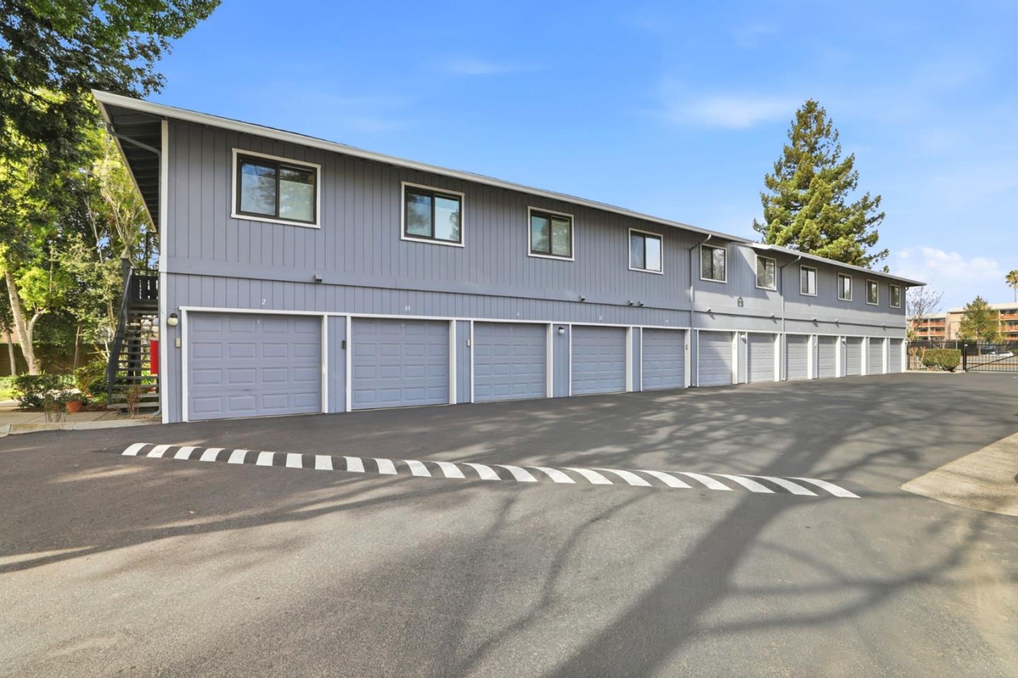 4013 Ralston Common Fremont, CA 94538 - Photo 34 of 40 a front view of a house with a yard and garage