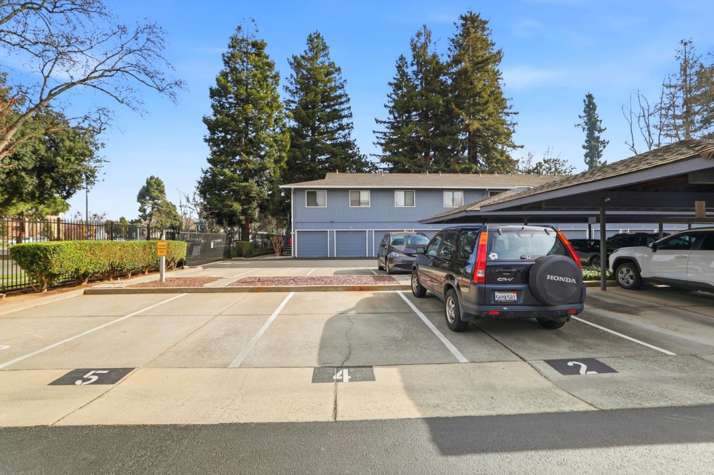 4013 Ralston Common Fremont, CA 94538 - Photo 36 of 40 a front view of a house with cars parked on road