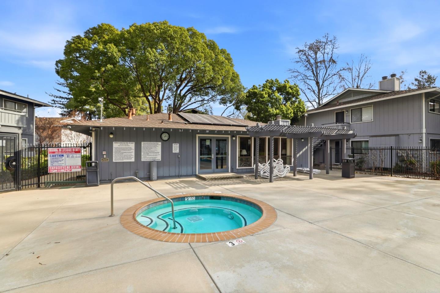 4013 Ralston Common Fremont, CA 94538 - Photo 39 of 40 a front view of a house with a yard patio and fire pit