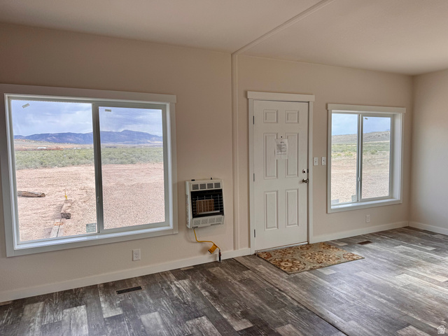 32 Sevier River, Unit 32 Levan, UT 84639 - Photo 7 of 50 Living room with independent propane wall heater.