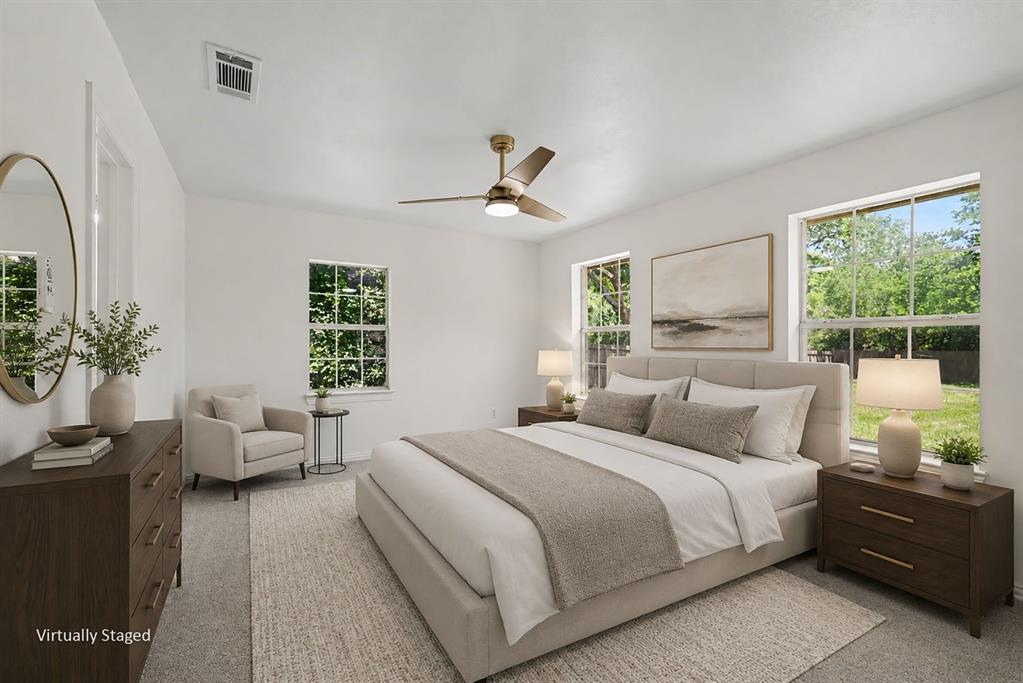 307 Dixon Street Terrell, TX 75160 - Photo 17 of 32 Spacious bedroom featuring light-toned walls and plush carpeting