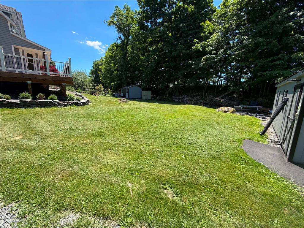 164 Sand Spring Road Cresco, PA 18326 - Photo 19 of 60 A spacious, well-maintained lawn provides ample outdoor living space.