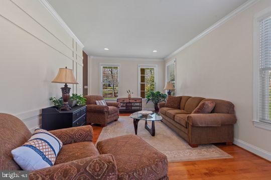 784 Olivia Way Pasadena, MD 21122 - Photo 15 of 38 a living room with furniture a couch and window