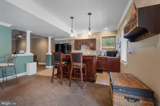 784 Olivia Way Pasadena, MD 21122 - Photo 27 of 38 a view of a dining room with furniture window and outside view