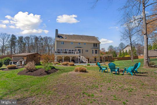 784 Olivia Way Pasadena, MD 21122 - Photo 33 of 38 a view of a house with backyard and sitting area
