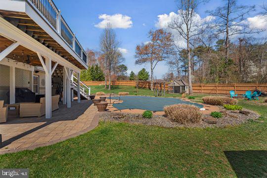 784 Olivia Way Pasadena, MD 21122 - Photo 34 of 38 a view of a house with a yard and a fountain