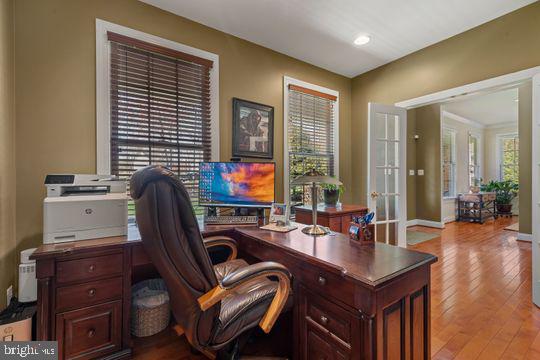 784 Olivia Way Pasadena, MD 21122 - Photo 4 of 38 a view of a workspace with furniture and a window