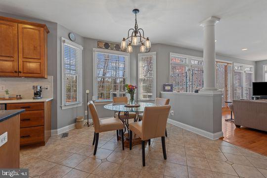784 Olivia Way Pasadena, MD 21122 - Photo 10 of 38 a view of a dining room with furniture window and outside view