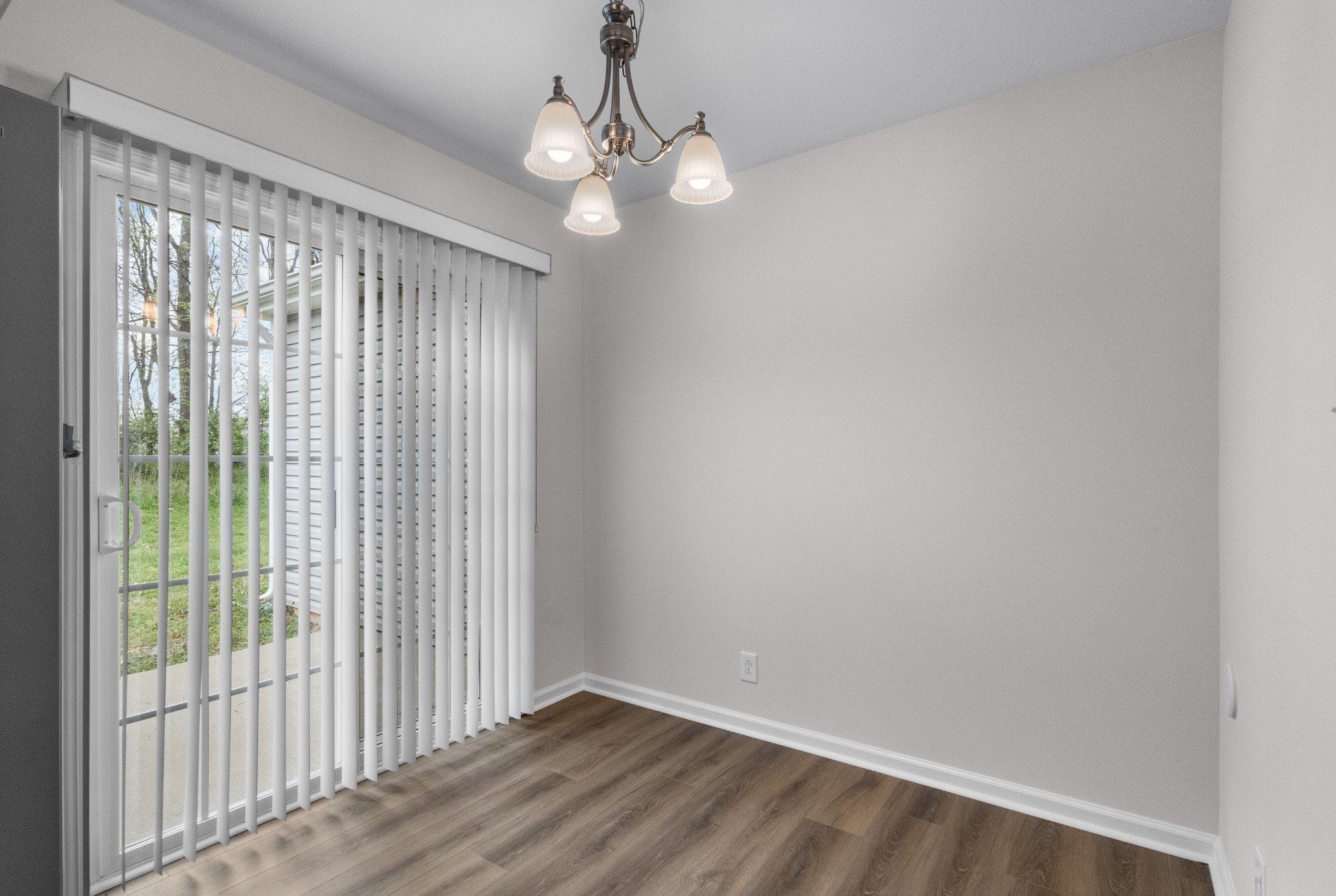 179 Alexander Boulevard Clarksville, TN 37040 - Photo 18 of 40 wooden floor in an empty room with a window