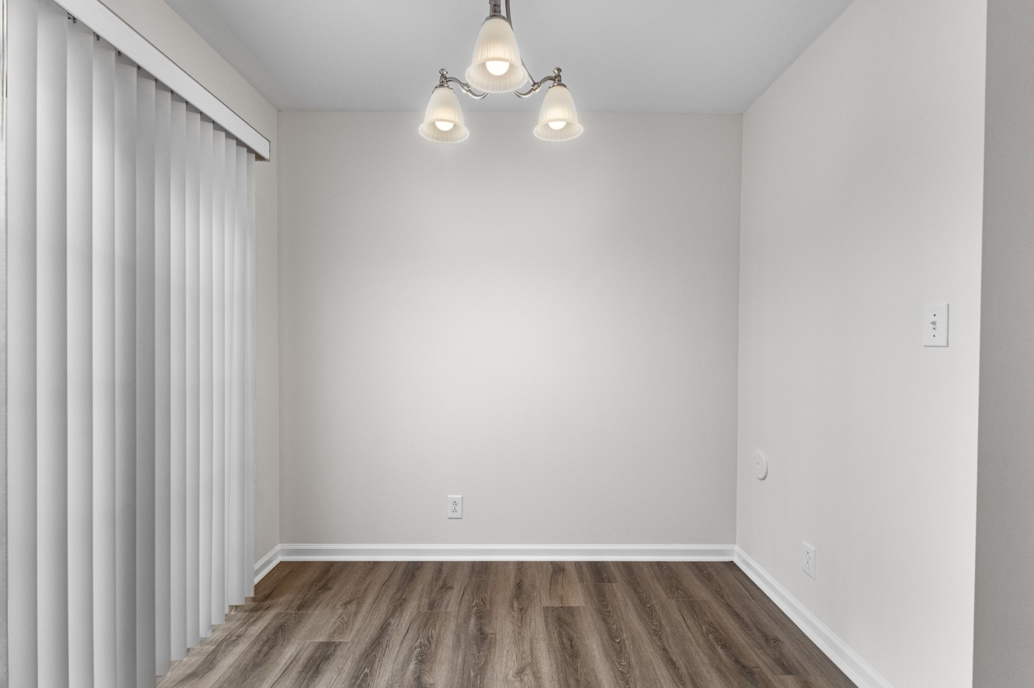 179 Alexander Boulevard Clarksville, TN 37040 - Photo 19 of 40 a view of room with window and hardwood floor
