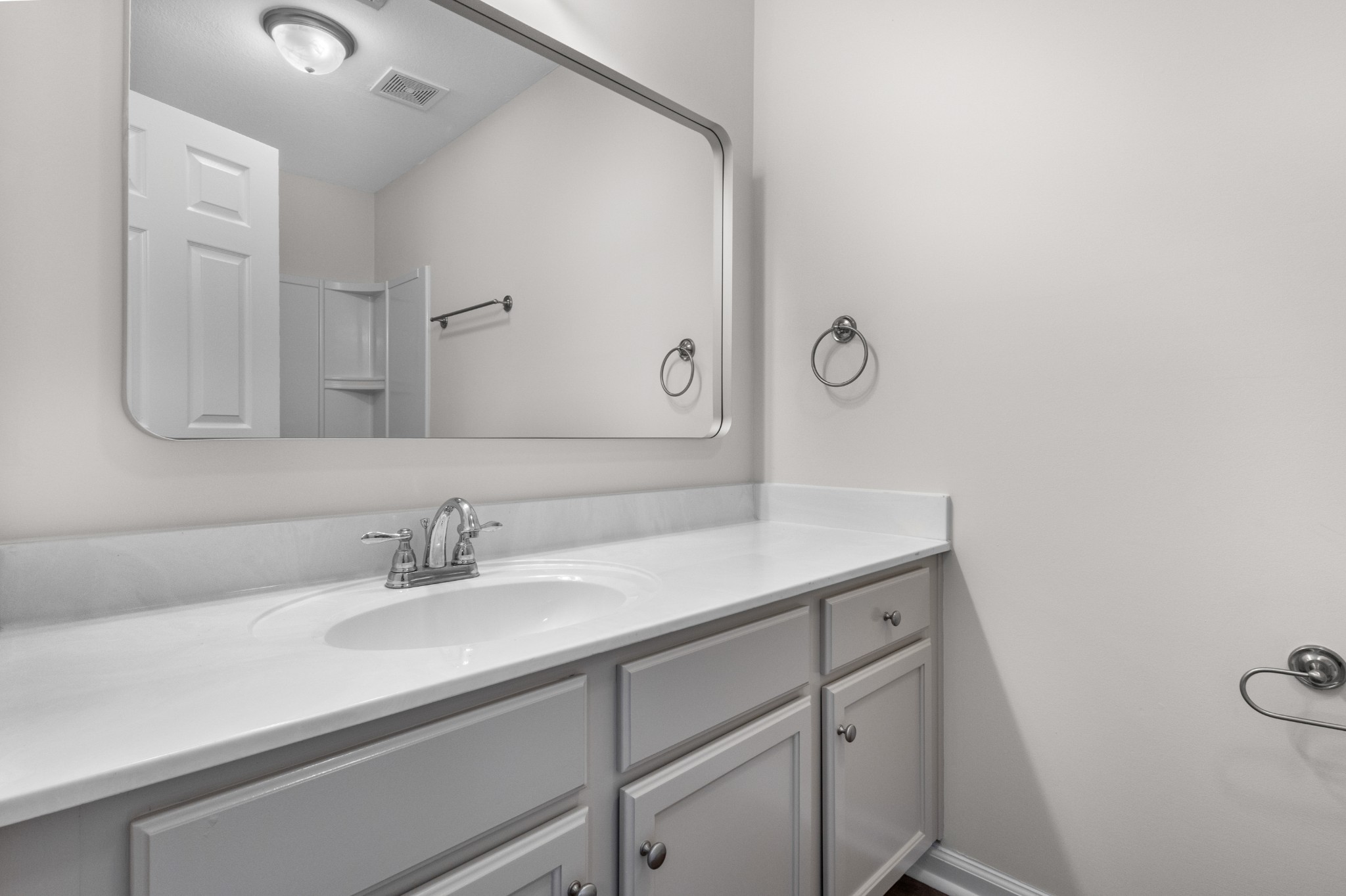 179 Alexander Boulevard Clarksville, TN 37040 - Photo 23 of 40 a bathroom with a sink and a mirror