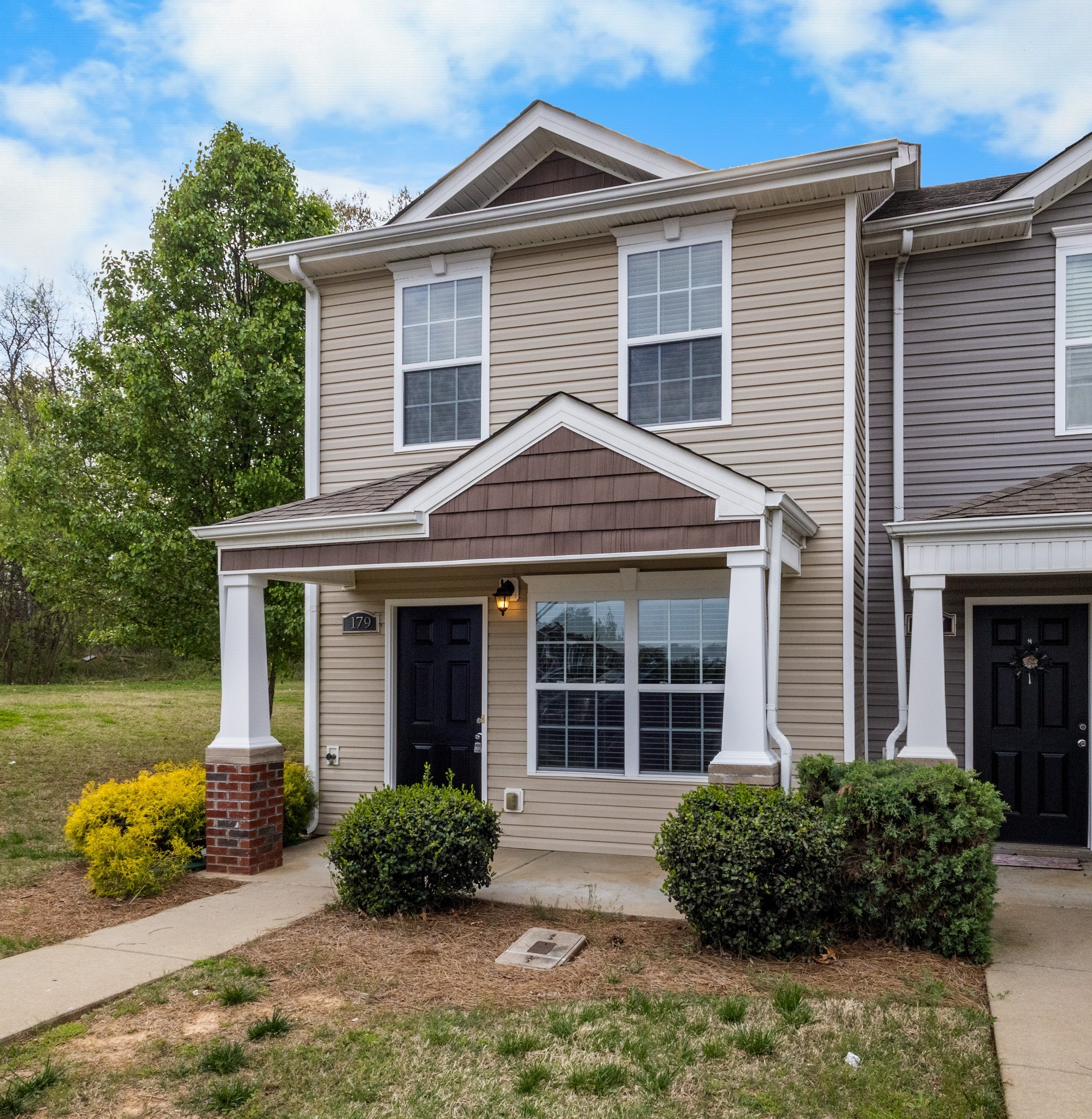 179 Alexander Boulevard Clarksville, TN 37040 - Photo 3 of 40 a view of a house with a yard and potted plants