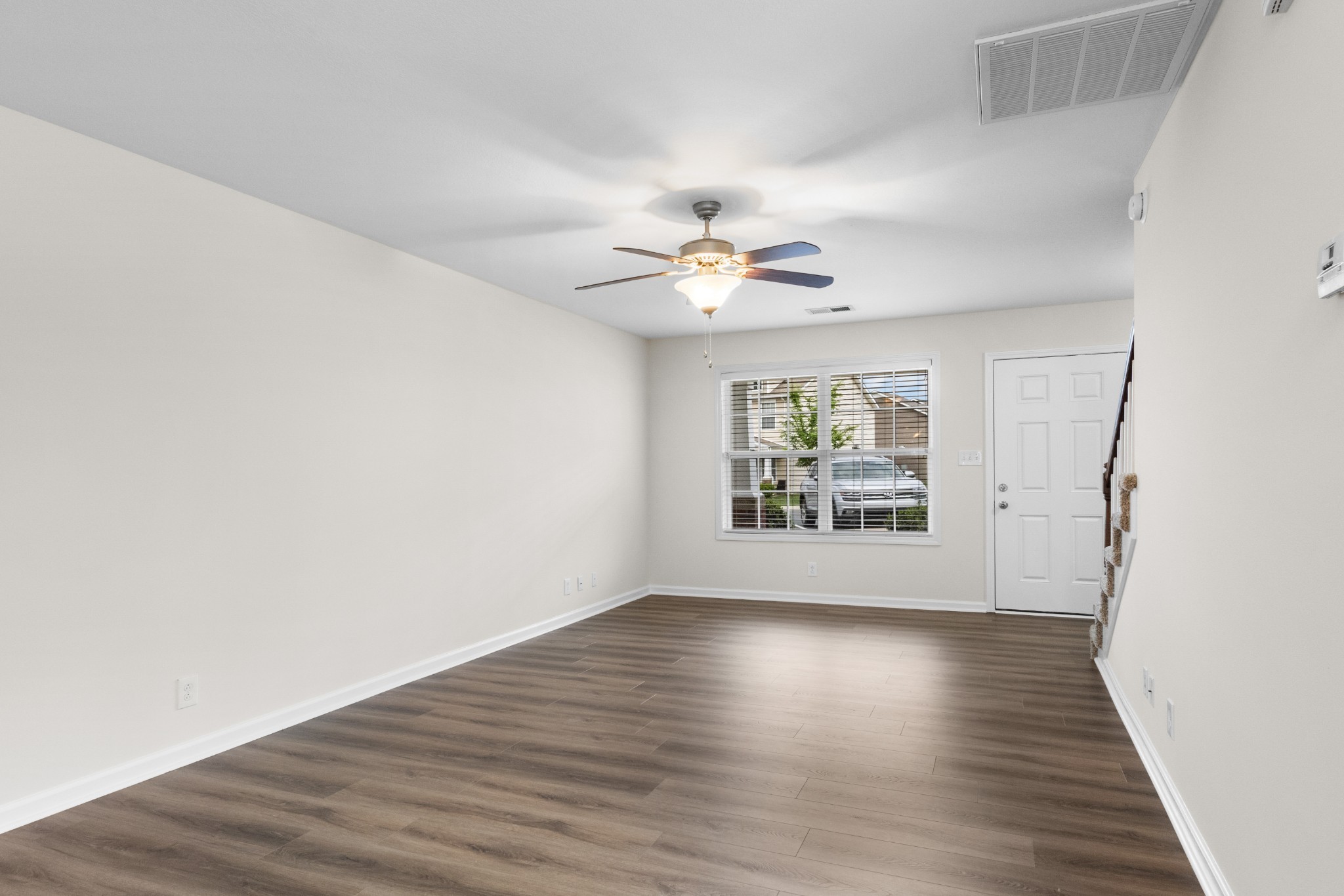 179 Alexander Boulevard Clarksville, TN 37040 - Photo 10 of 40 wooden floor in an empty room with a window