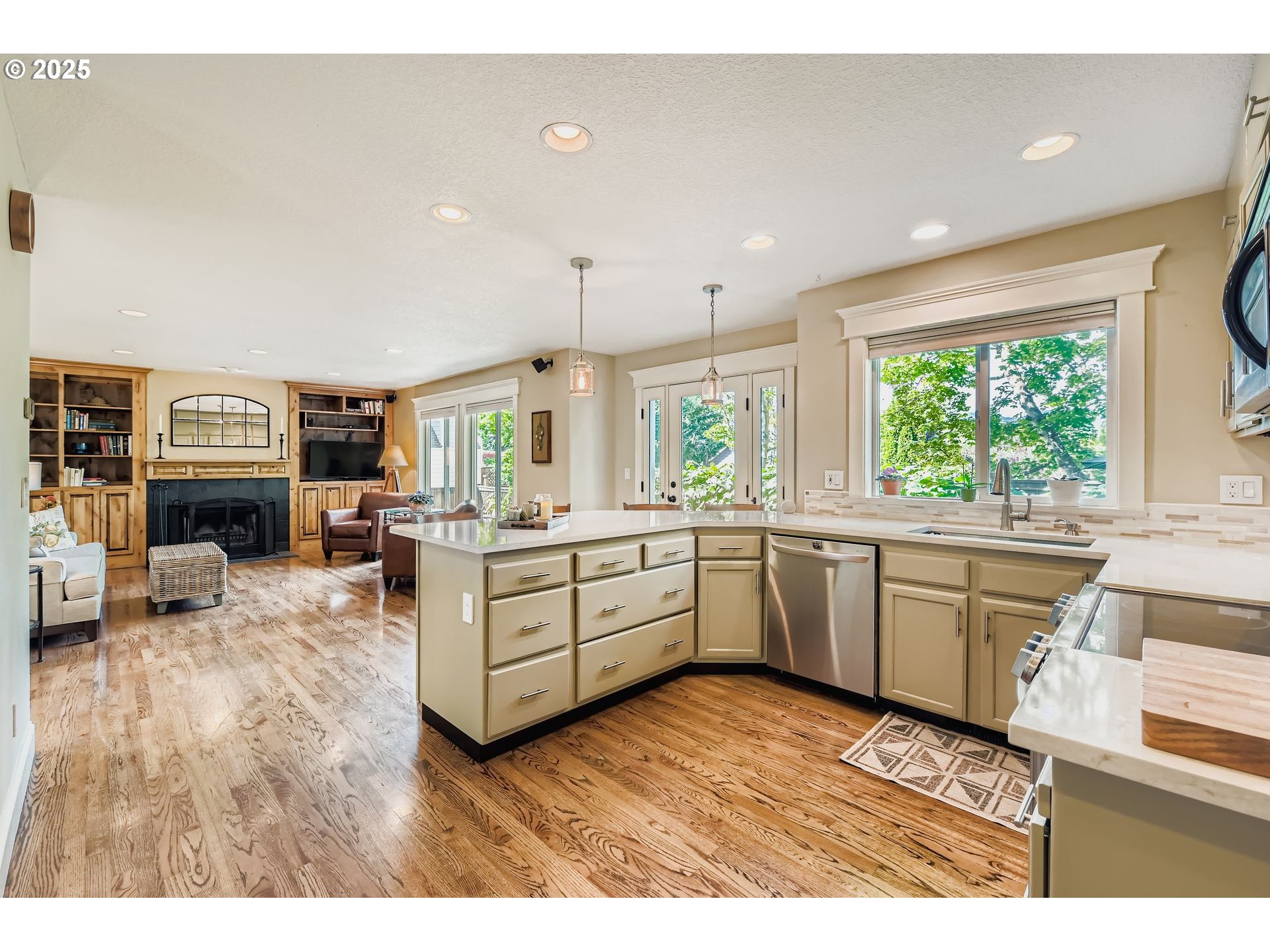 716 Roxe Drive Forest Grove, OR 97116 - Photo 11 of 37 a kitchen with sink cabinets and wooden floor