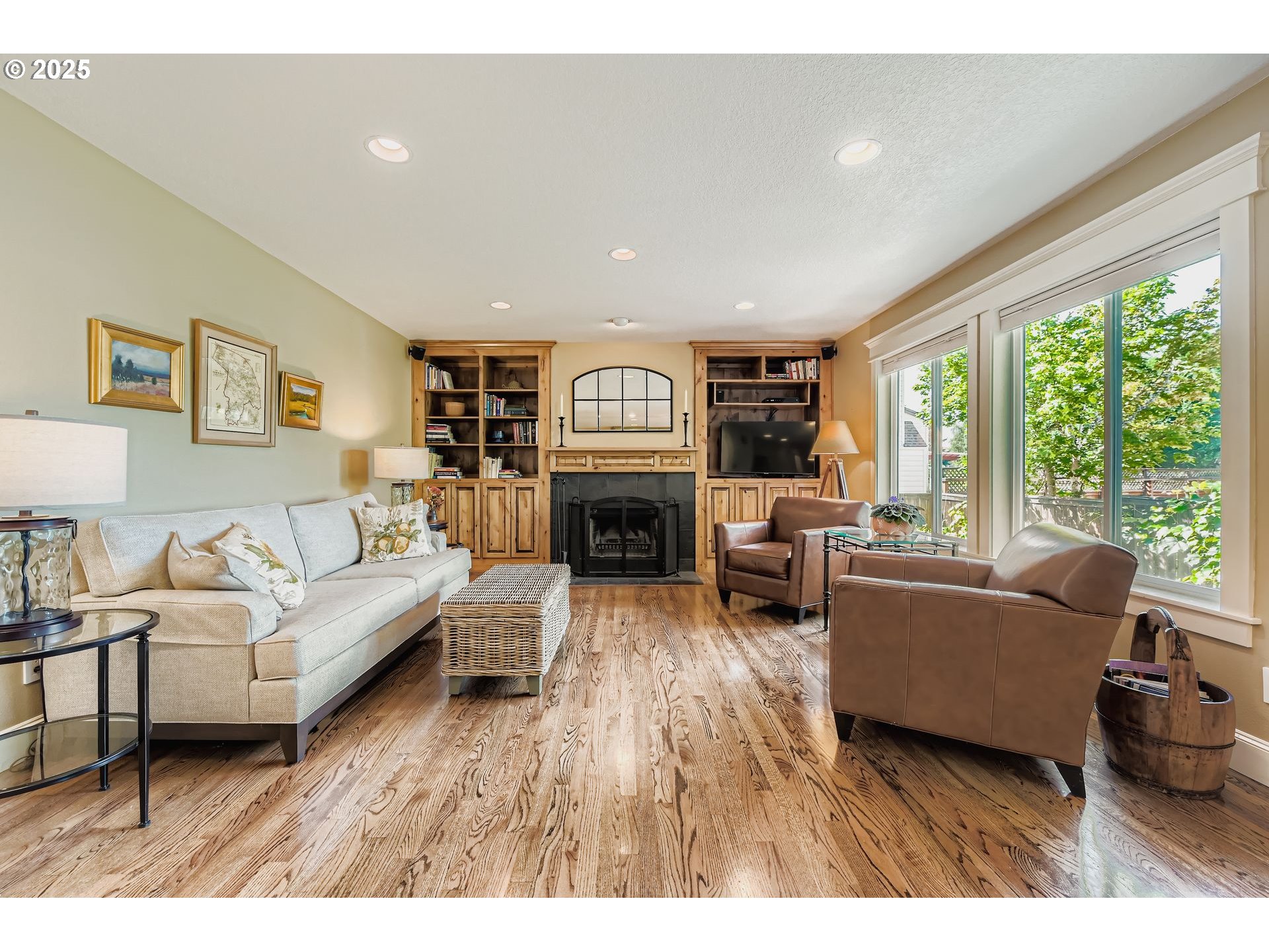 716 Roxe Drive Forest Grove, OR 97116 - Photo 12 of 37 a living room with furniture and a fireplace