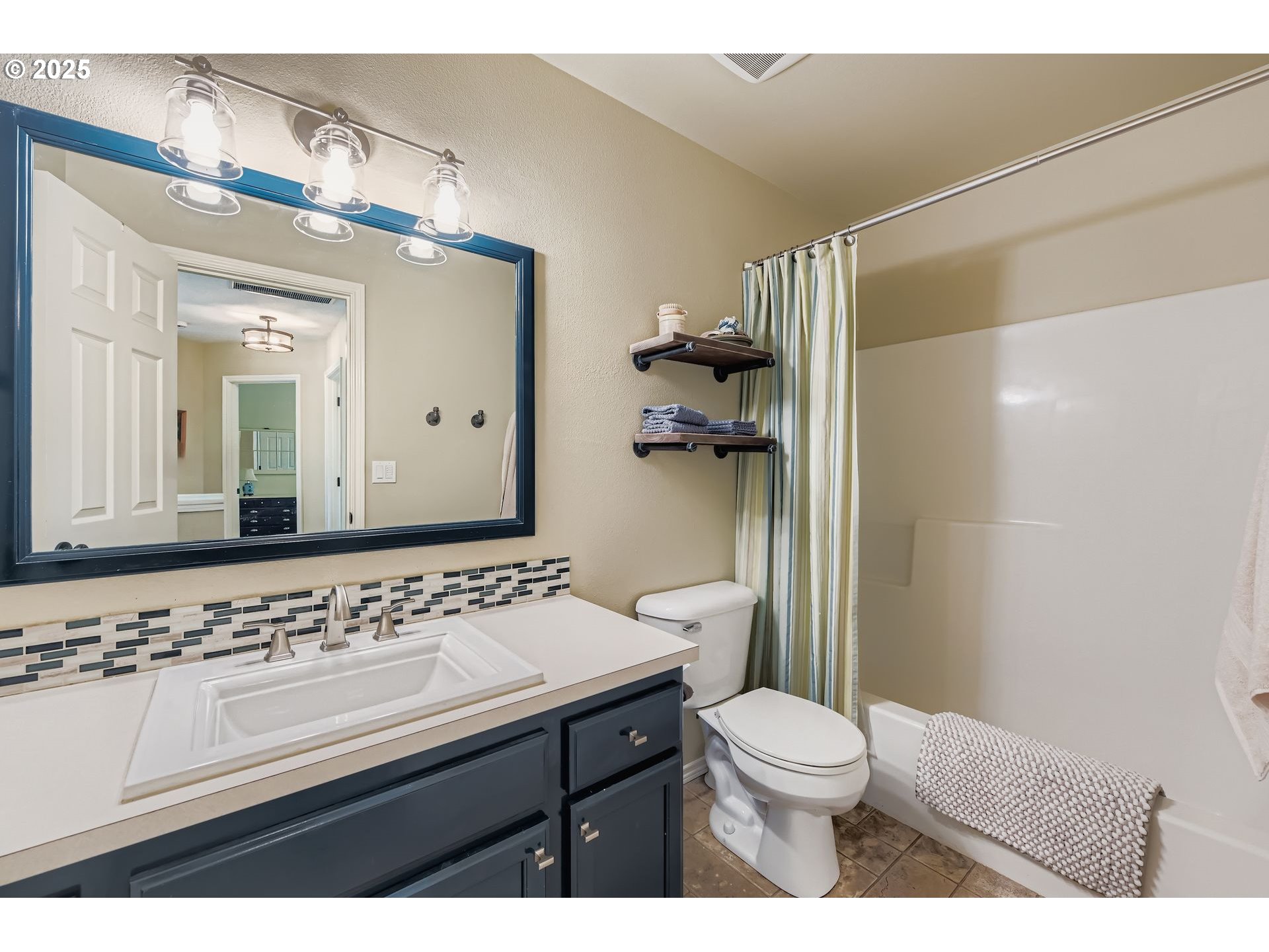 716 Roxe Drive Forest Grove, OR 97116 - Photo 22 of 37 a bathroom with a sink a toilet and shower