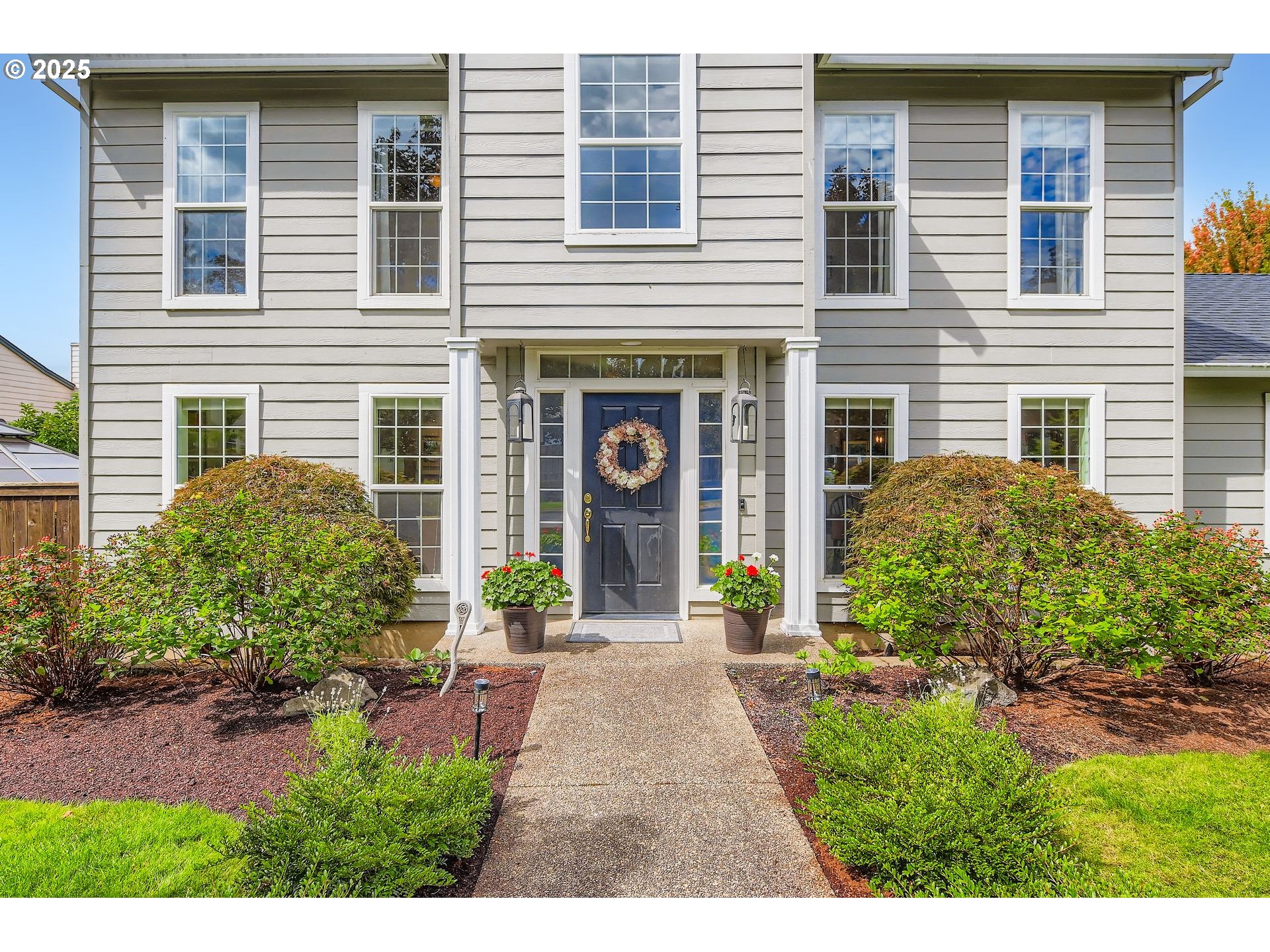 716 Roxe Drive Forest Grove, OR 97116 - Photo 3 of 37 a view of entrance of house and yard with green space