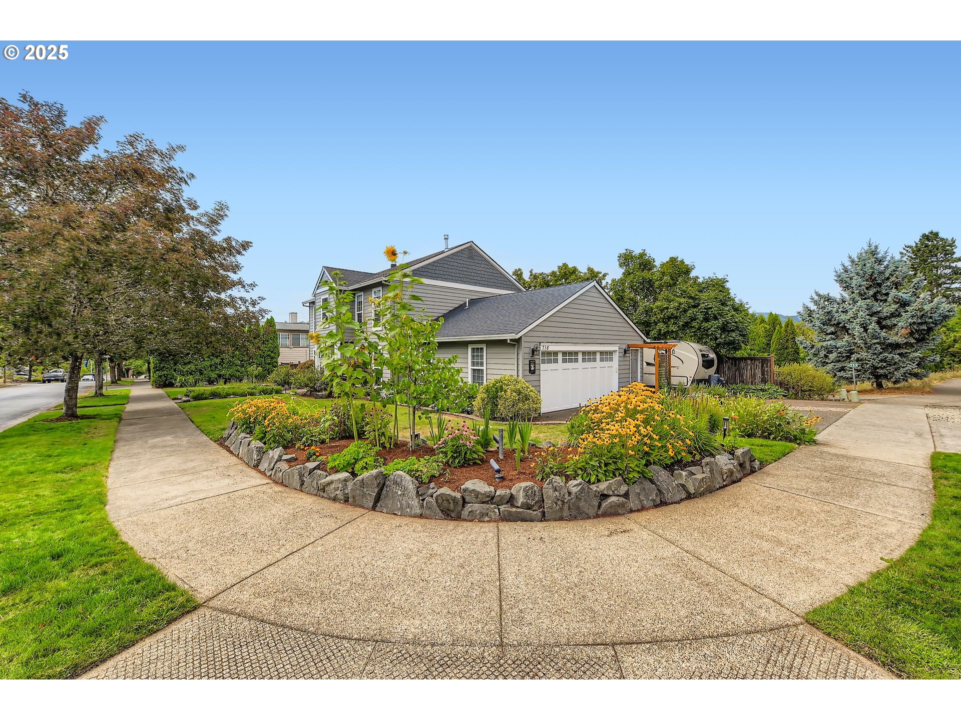 716 Roxe Drive Forest Grove, OR 97116 - Photo 35 of 37 a view of a house with a yard