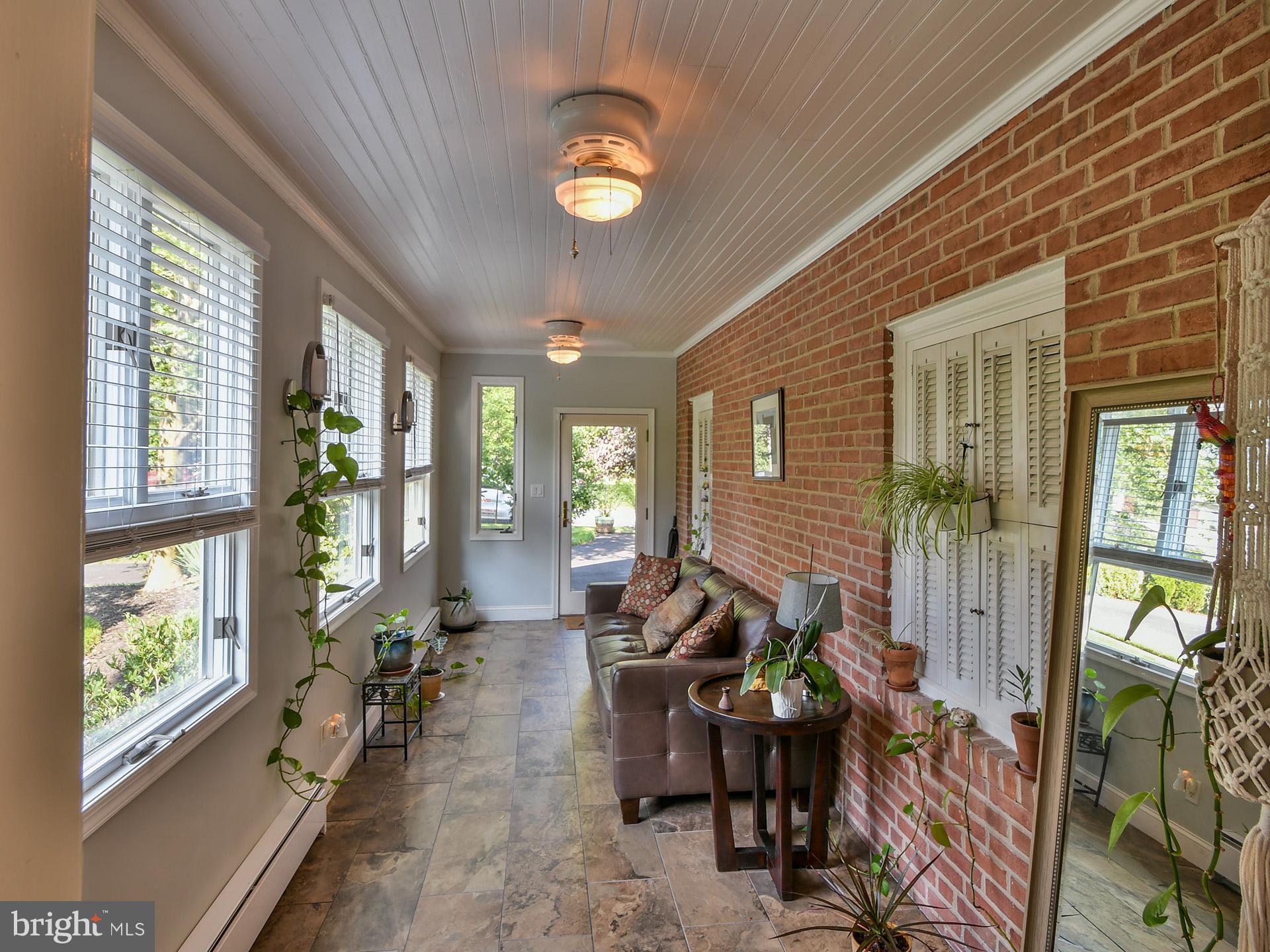 12 Tamworth Road Baltimore, MD 21210 - Photo 19 of 50 Sunroom with new title breezeway