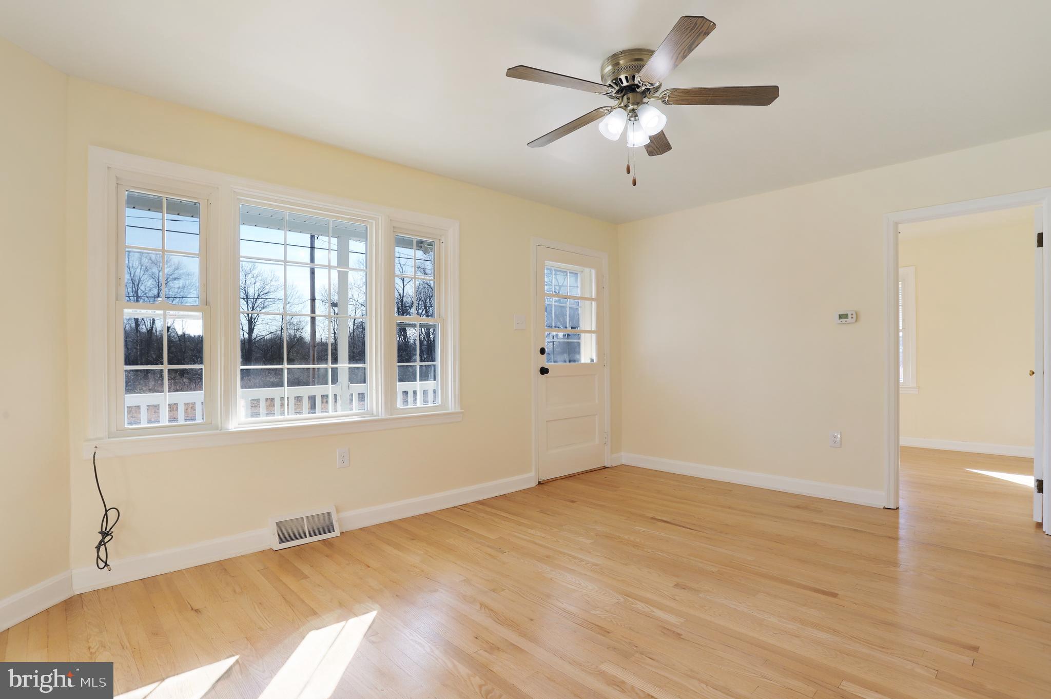 12112 Walnut Point Road Hagerstown, MD 21740 - Photo 7 of 34 Living room - new replacement windows.