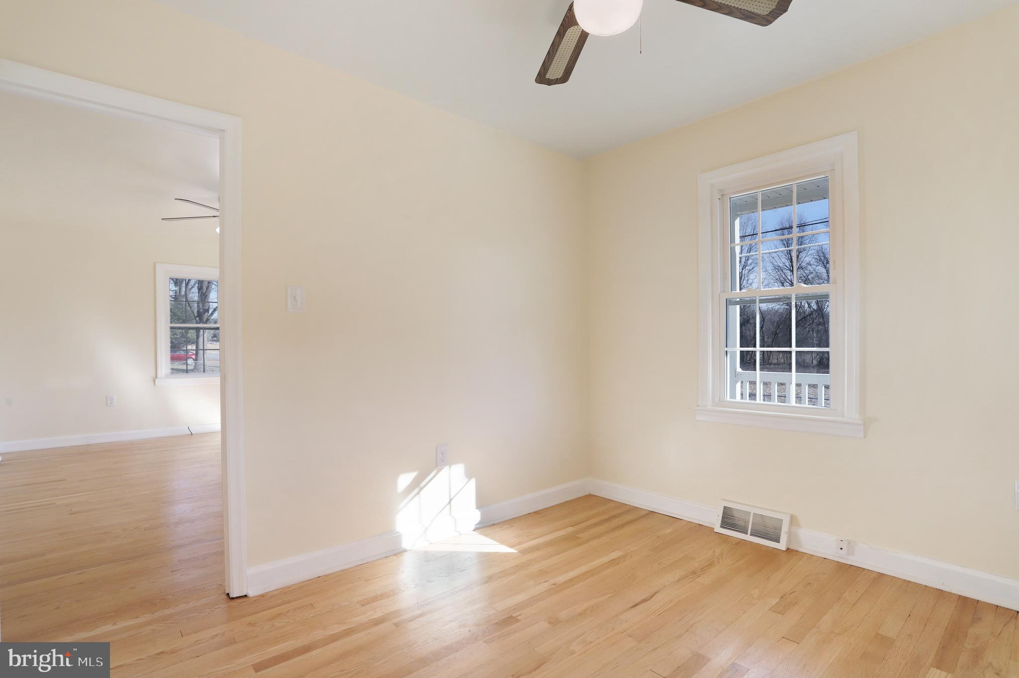 12112 Walnut Point Road Hagerstown, MD 21740 - Photo 9 of 34 Living room with re-finished hardwood flooring.