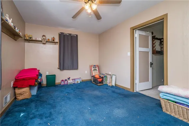 a view of a room with baby toys and toys