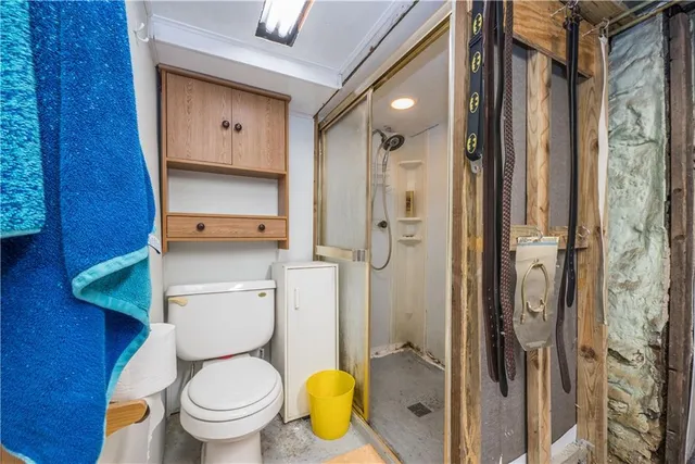 a view of gym equipment with racks